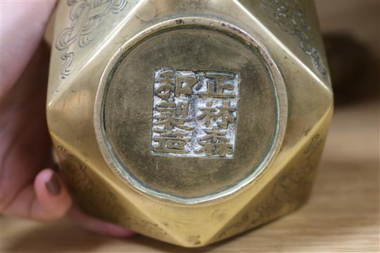 A Chinese bronze censer, a gu beaker vase and a polyhedral vase tallest 27cm